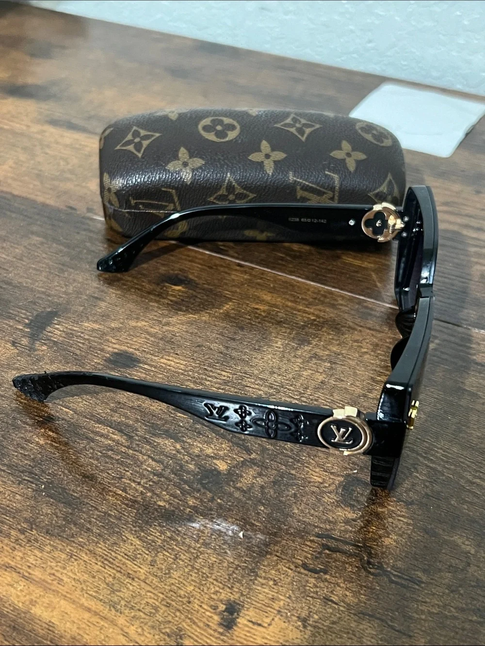 Louis Vuitton Black Sunglasses with Gold LV Medallions